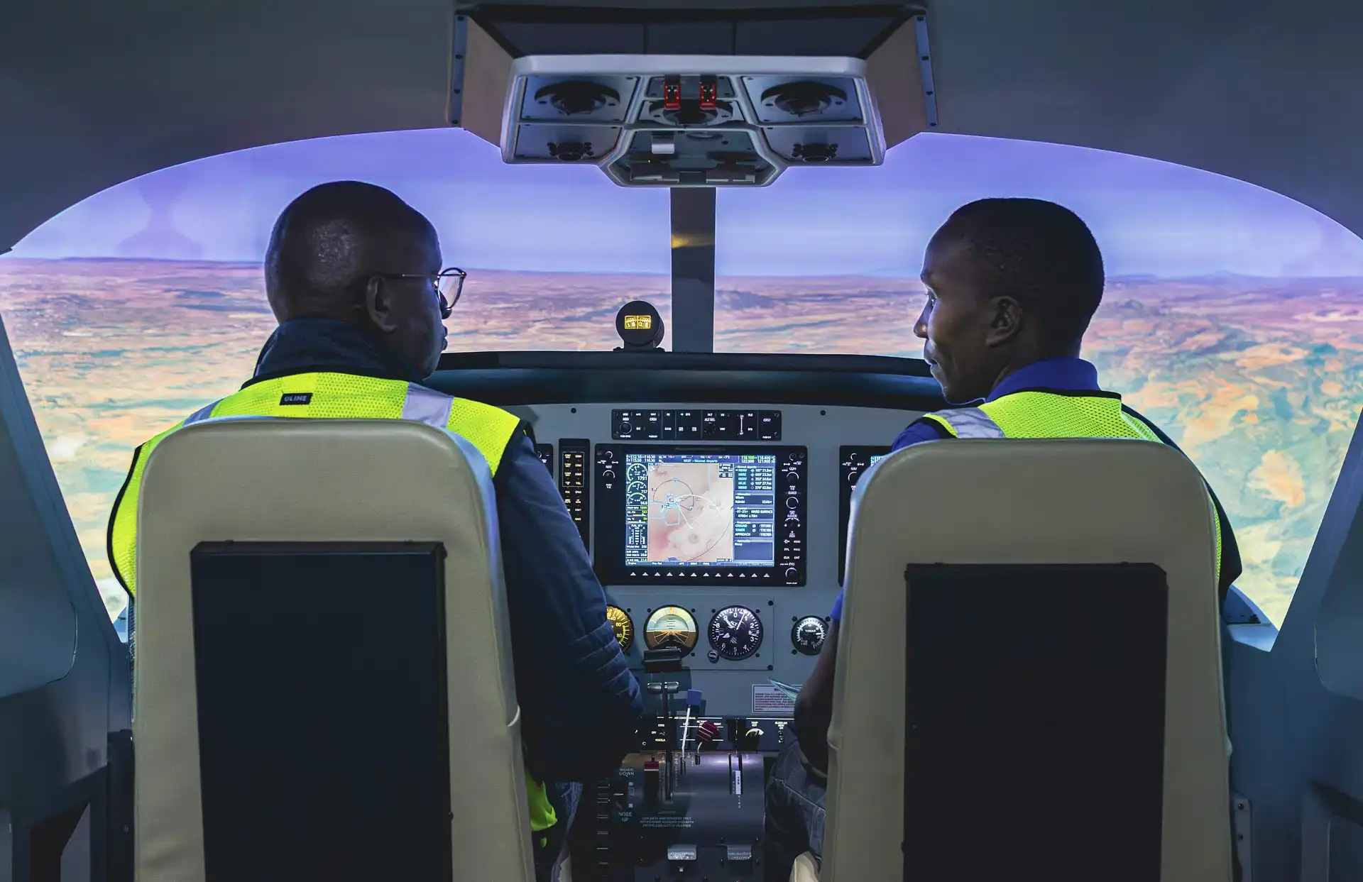 Pilot in cockpit during training flight over Nairobi
